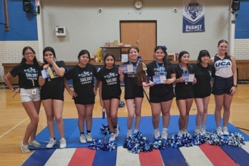 Coach Garza and the summer cheer camp participants